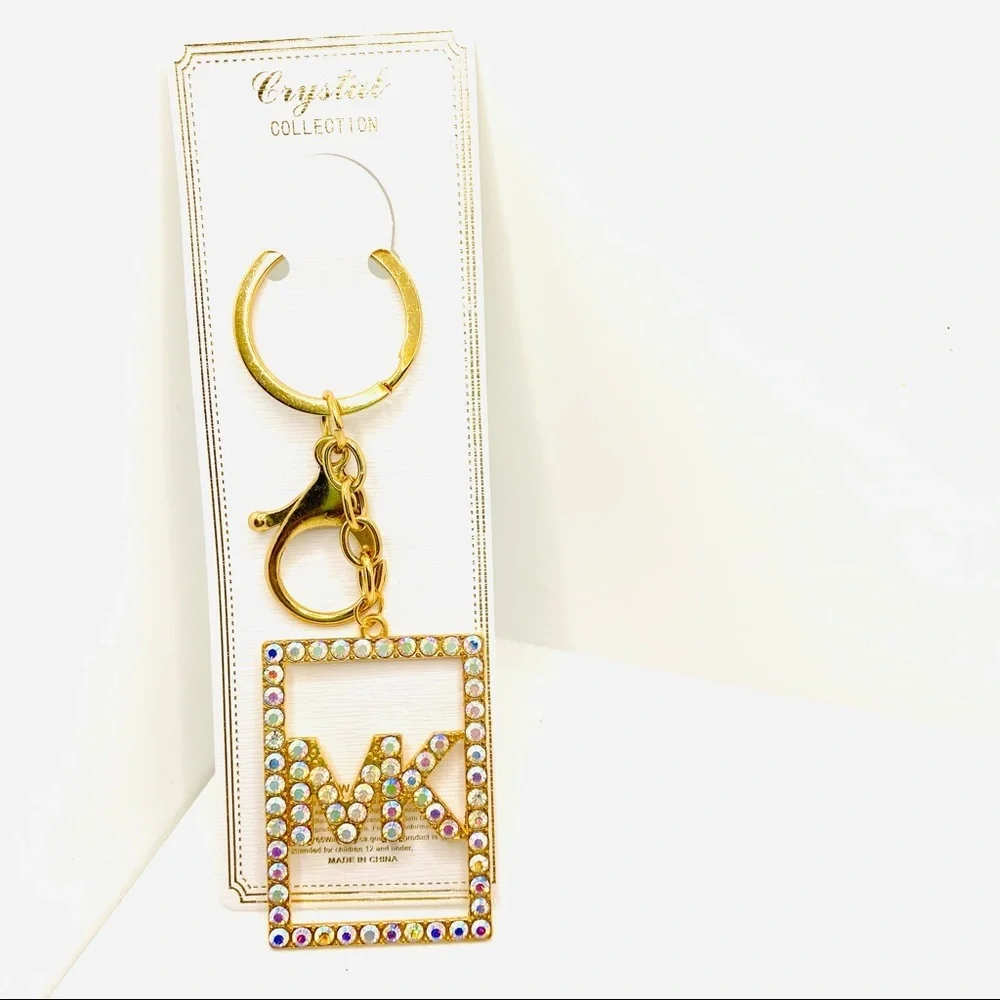 Purse Charm Key Chain MK in Iridescent Crystals set in golden tone. BRAND NEW